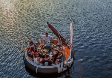 Overhead view of a group of people on a boat