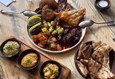 Entree served on a wooden table